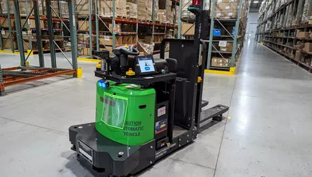 A Vecna AMR working in a GEODIS warehouse