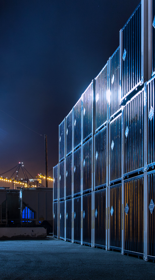 containers in a harbor by night