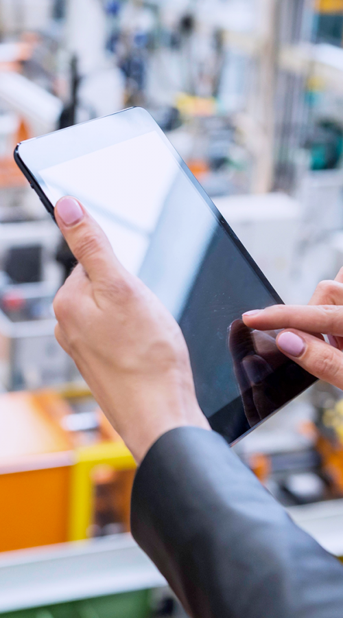 a woman is consulting a tablet