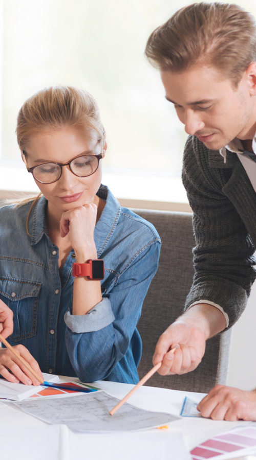 Two employees in work meeting