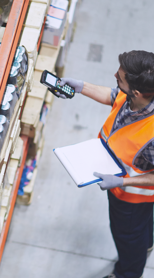 an employee quickly controls products with his barcode reader