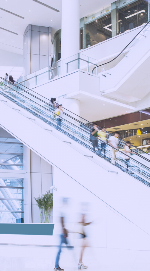 people take a white escalator 