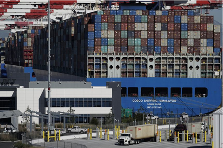 An image showing many shipping containers stacked on top of each other