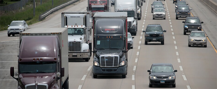 Image of trucks on a highway.