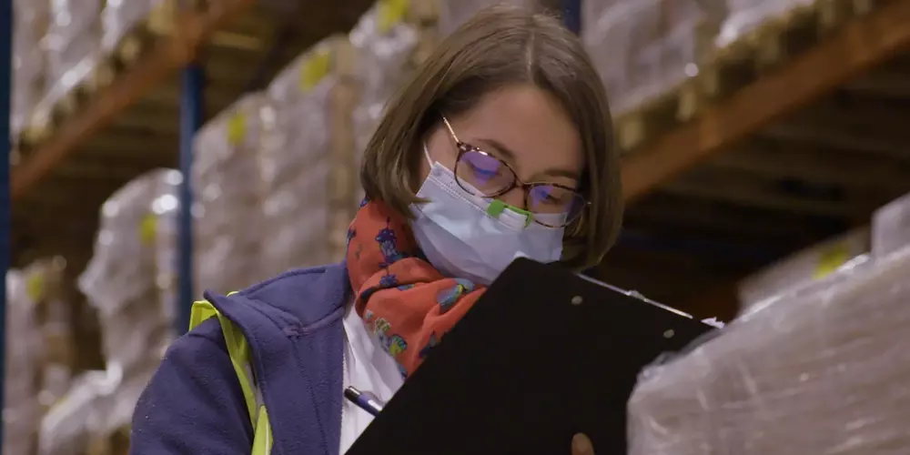 woman in a healthcare warehouse